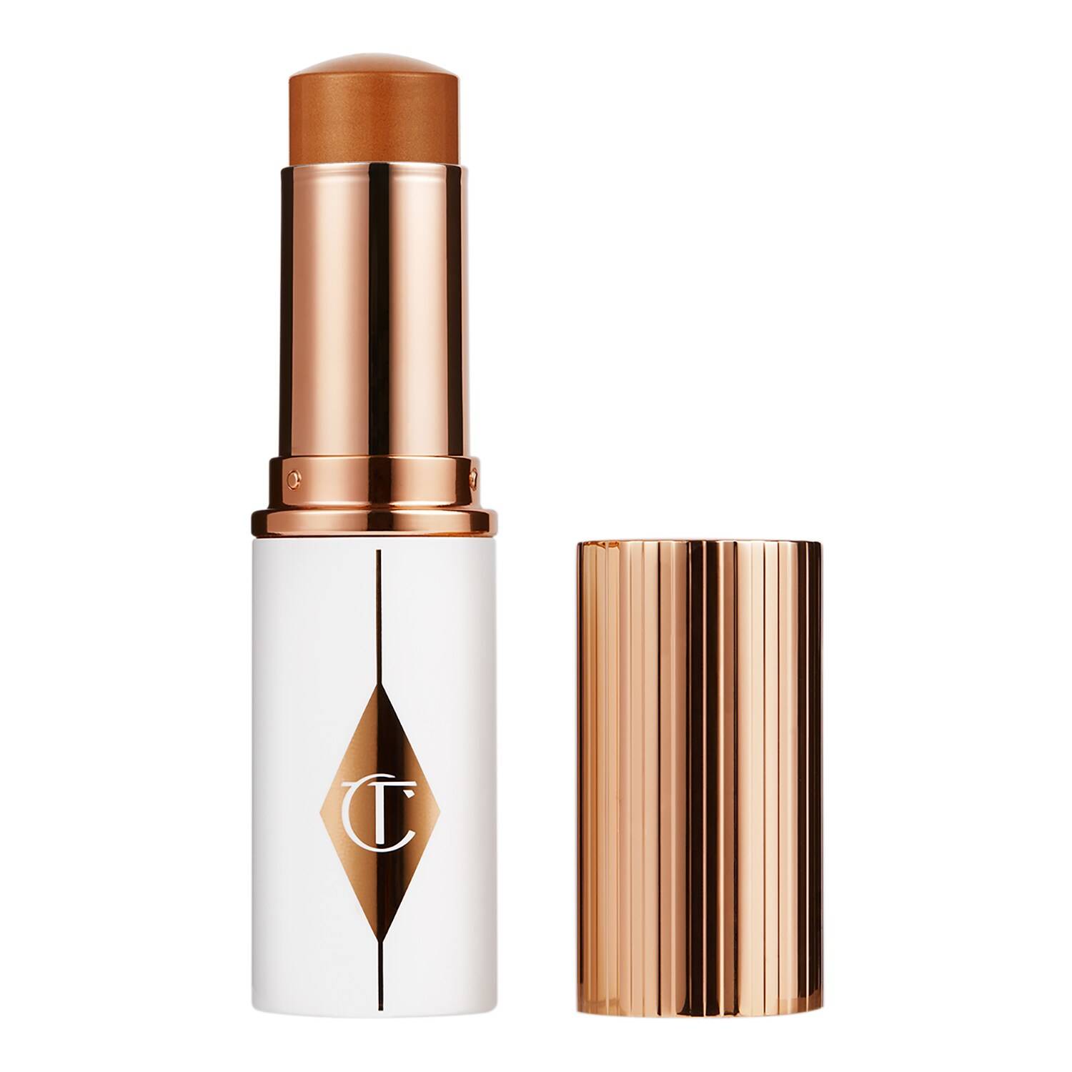CHARLOTTE TILBURY Unreal Skin Sheer Glow Tint - Hydrating Foundation Stick 12 Tan