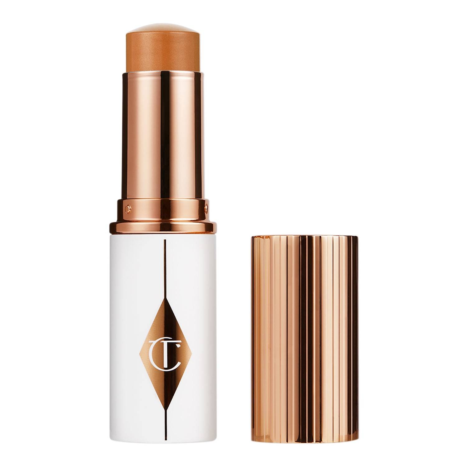 Charlotte Tilbury Unreal Skin Sheer Glow Tint - Hydrating Foundation Stick 10 Tan